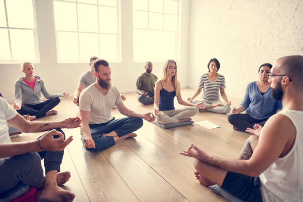 group meditating together image